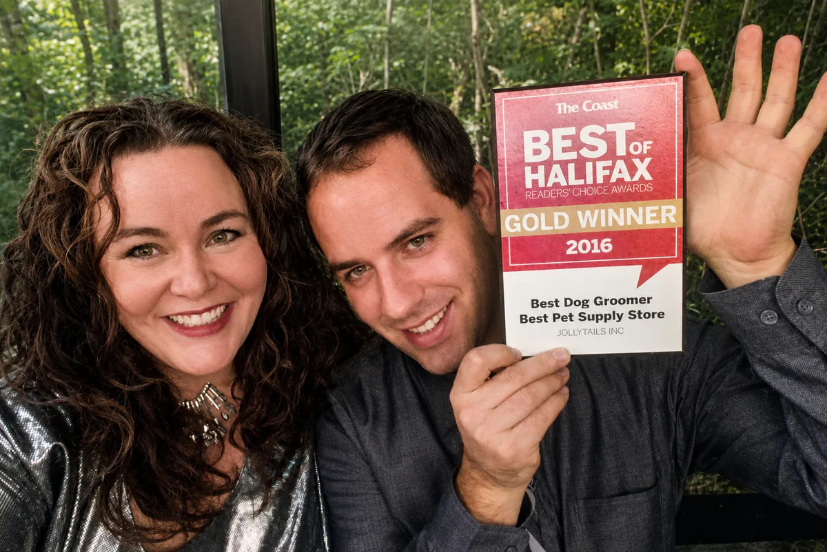 Jollytails founders Pamela Smith and Tristan Flynn holding a Best of Halifax Gold Winner award