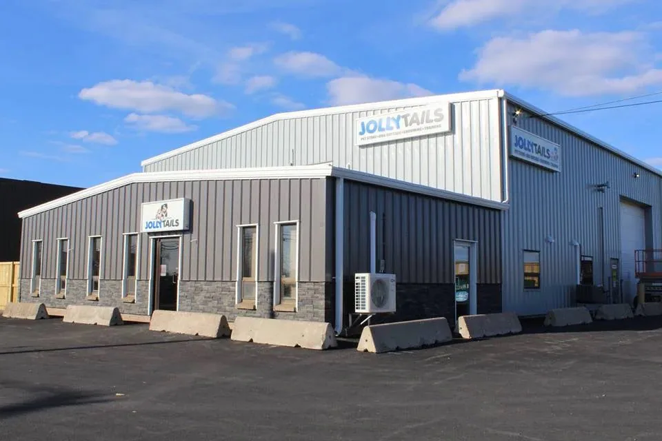 The Jollytails Burnside building beneath a bright blue sky