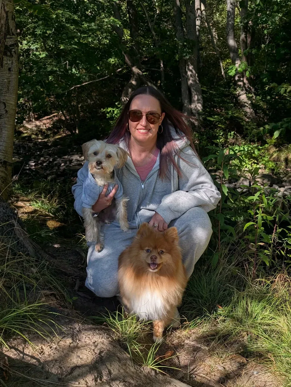 Karina from the Jollytails social team with a dog